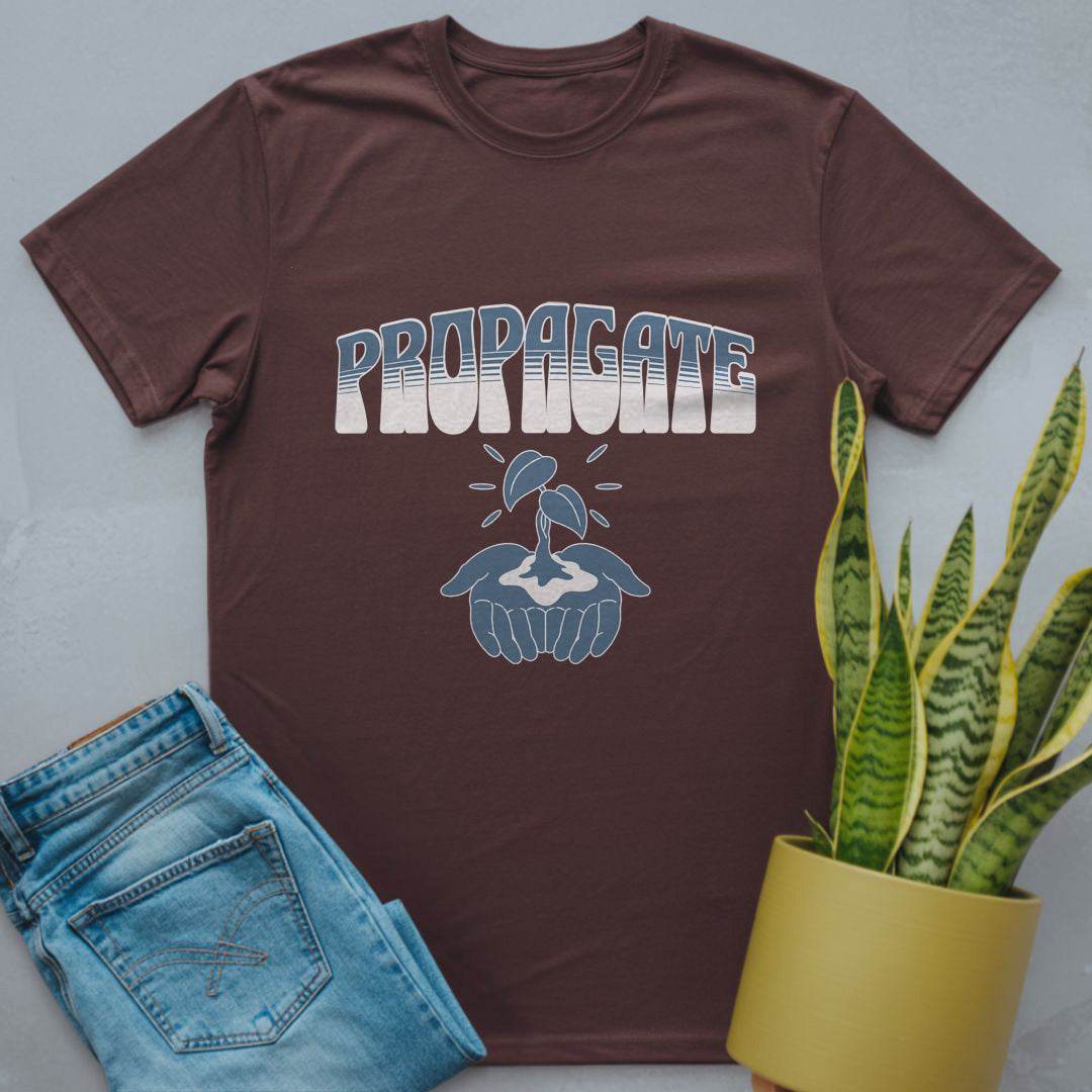 Propagate, Hand Holding Leaves Shirt Dark Chocolate / S